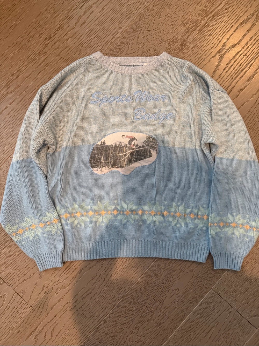 Vintage “sports wear badge” Light Blue Patterned Ski graphic sweater